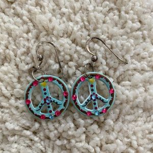 Dangling Peace Sign Earrings With Gems